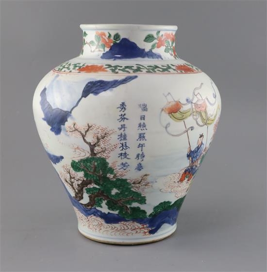A Chinese wucai baluster vase, Transitional period c.1640, H.28cm, restorations